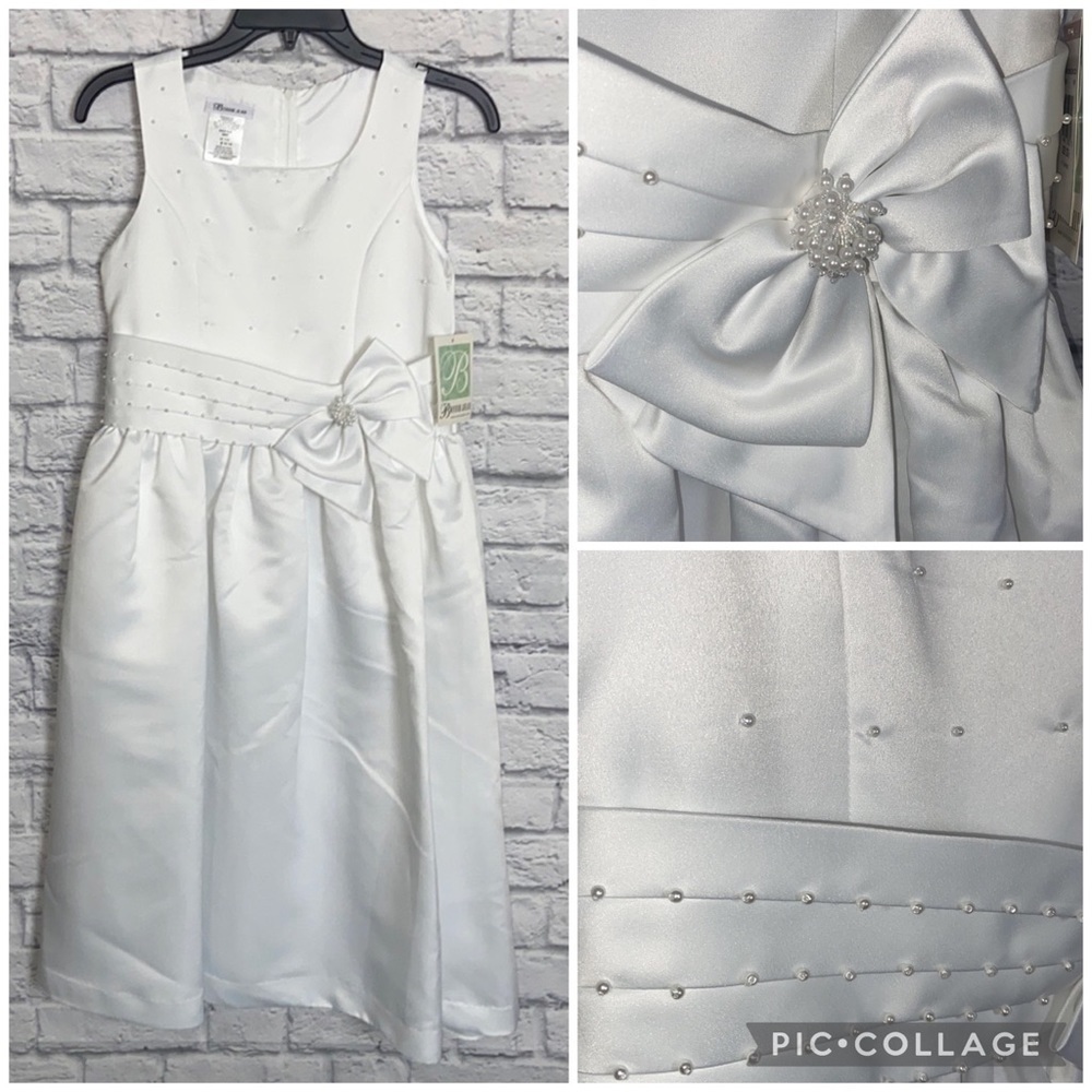 Bonnie Jean Girl's 12 1/2 White Pearl and Bow Layered Formal Dress
